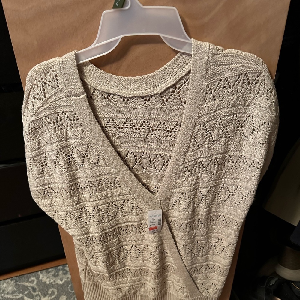 New with tags Maurice’s crocheted over shirt.  Size Large.